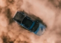 Rivian R1T electric truck in front of building