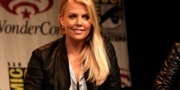 charlize theron with daughters at africa outreach project event