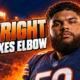 Darnell Wright flexes elbow at Bears camp