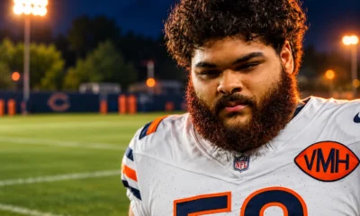 Darnell Wright flexes right elbow at Bears camp